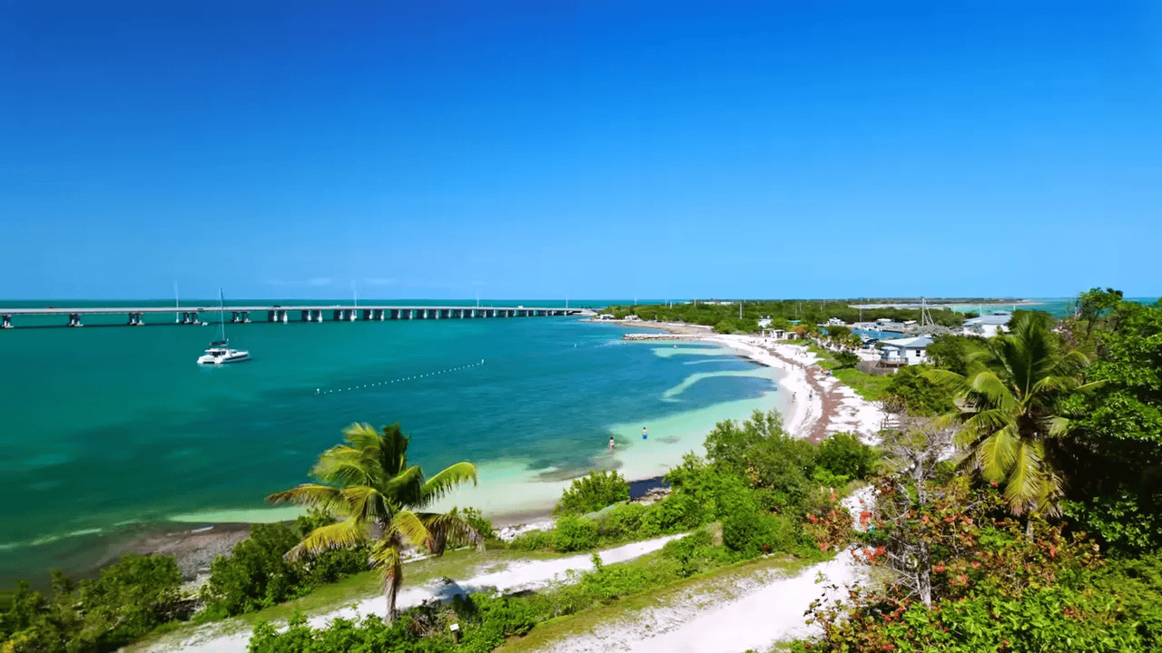 10 BEST State Parks in Florida (Beaches, History, Springs & Hidden Gems!) 10 Sandy shoreline and old bridge at Bahia Honda State Park